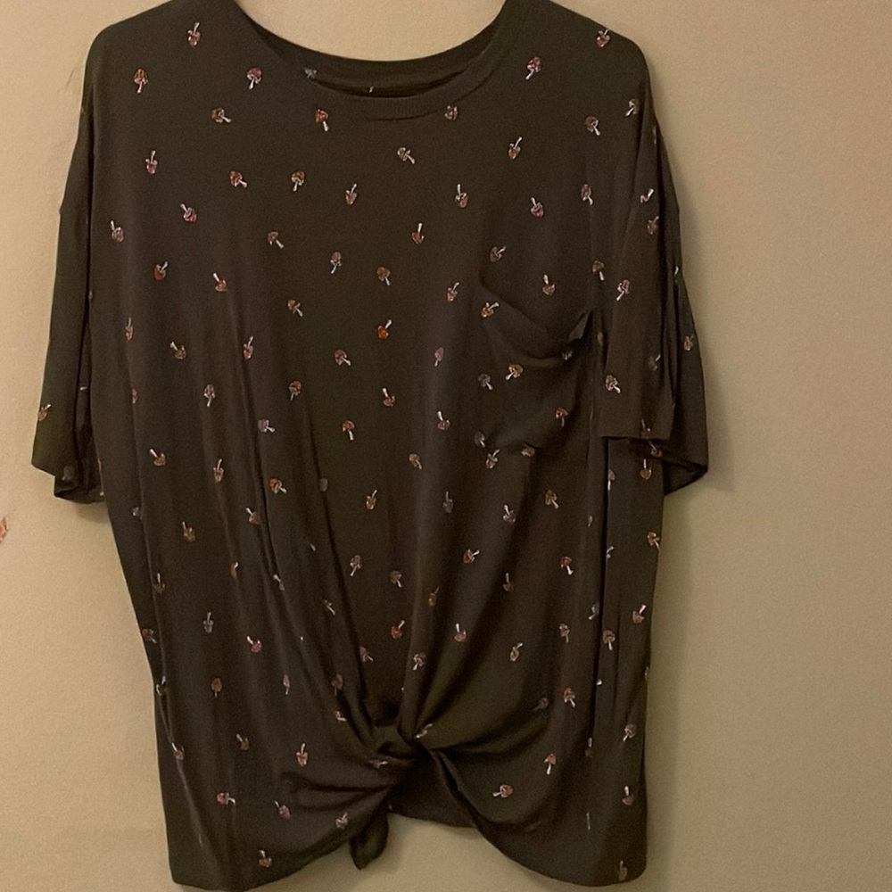Green blouse with little mushrooms.